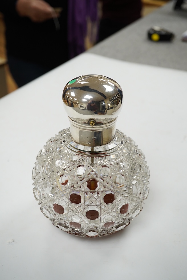 A large Victorian silver mounted cut glass scent bottle, marks rubbed, height 17cm. Condition - poor